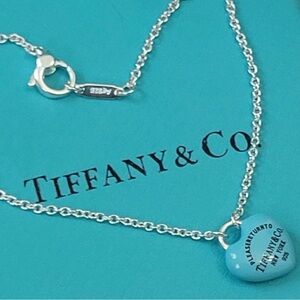Tiffany & Co. Silver Necklace with Iconic Blue Charm